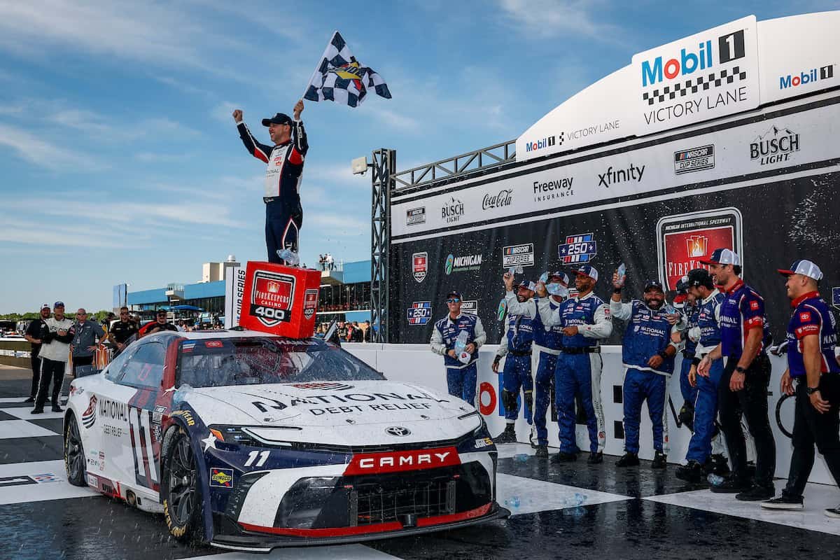 Denny Hamlin's No. 11 Joe Gibbs Racing Toyota celebrates victory at Michigan International Speedway