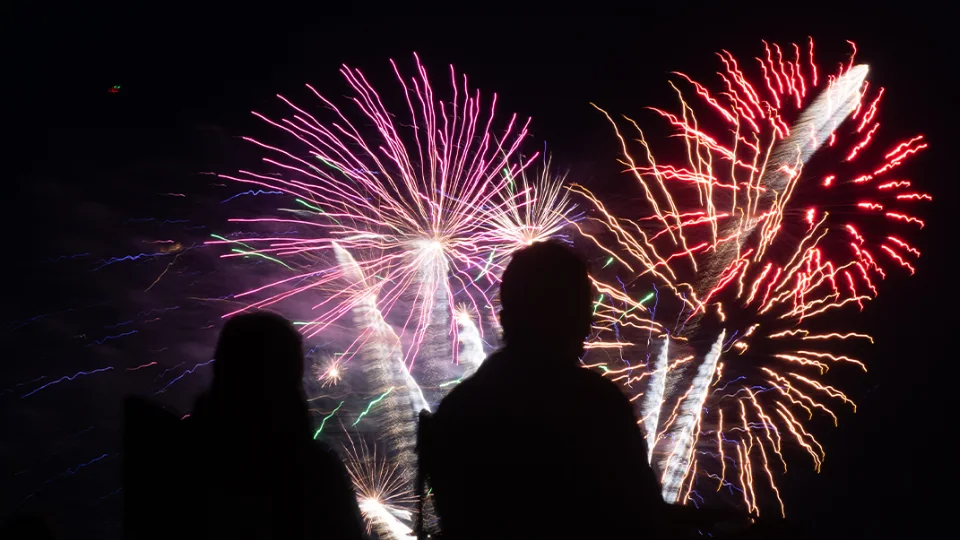 Fireworks display over a motorsports venue celebrating Independence Day weekend racing at Mid-Ohio