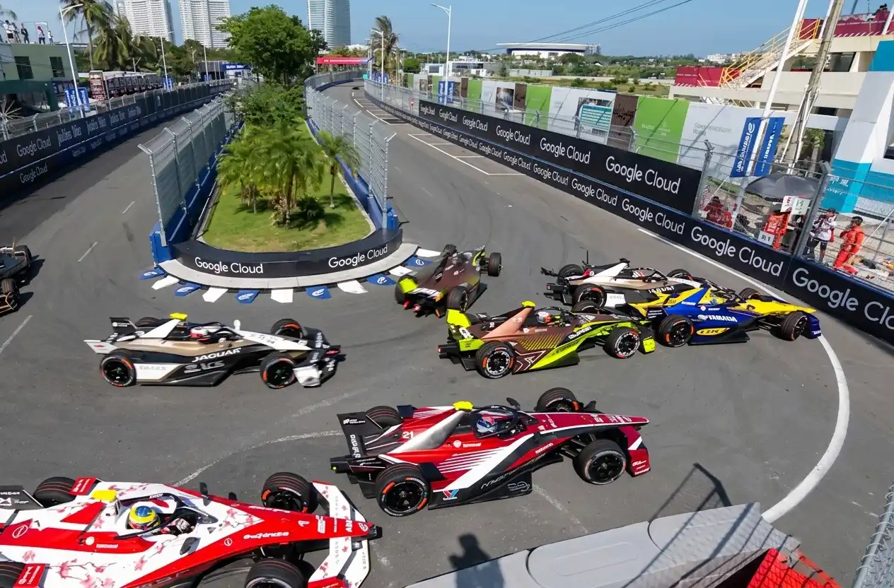 Formula E team garages during a race weekend — ten manufacturers and 20 drivers competing in the 2026 ABB FIA Formula E World Championship
