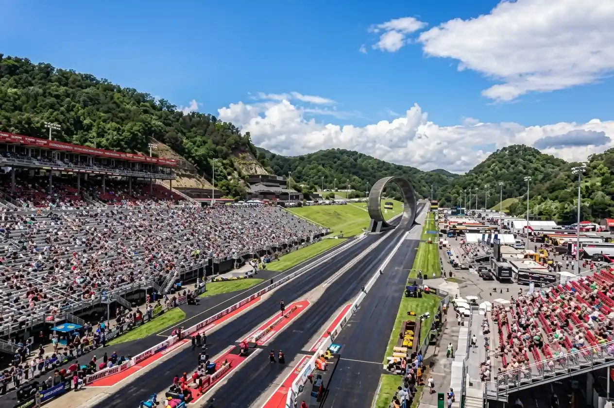 Aerial view of Bristol Dragway during the 2026 NHRA Thunder Valley Nationals showing packed grandstands and NHRA drag strip