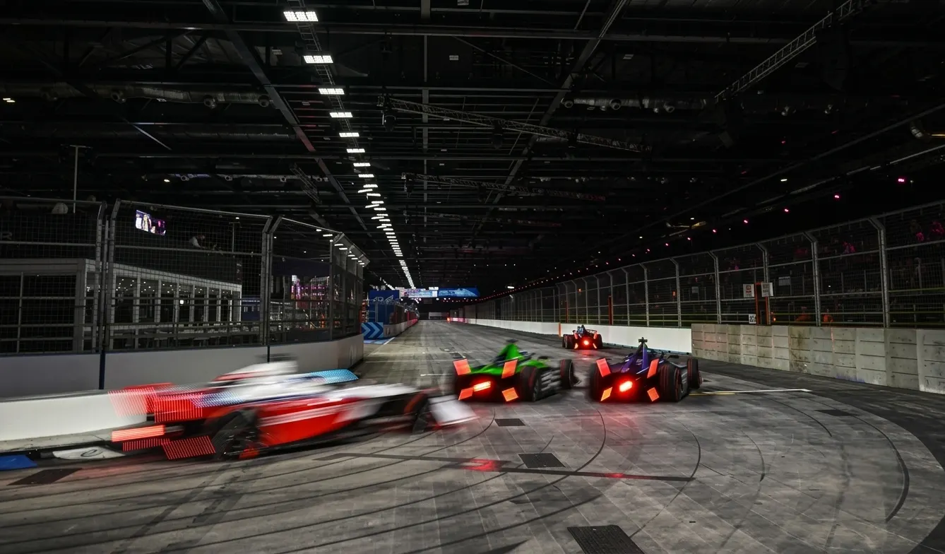 Formula E Gen3 Evo electric race car at speed on urban street circuit — the technical package and aerodynamic design of the 2026 season car
