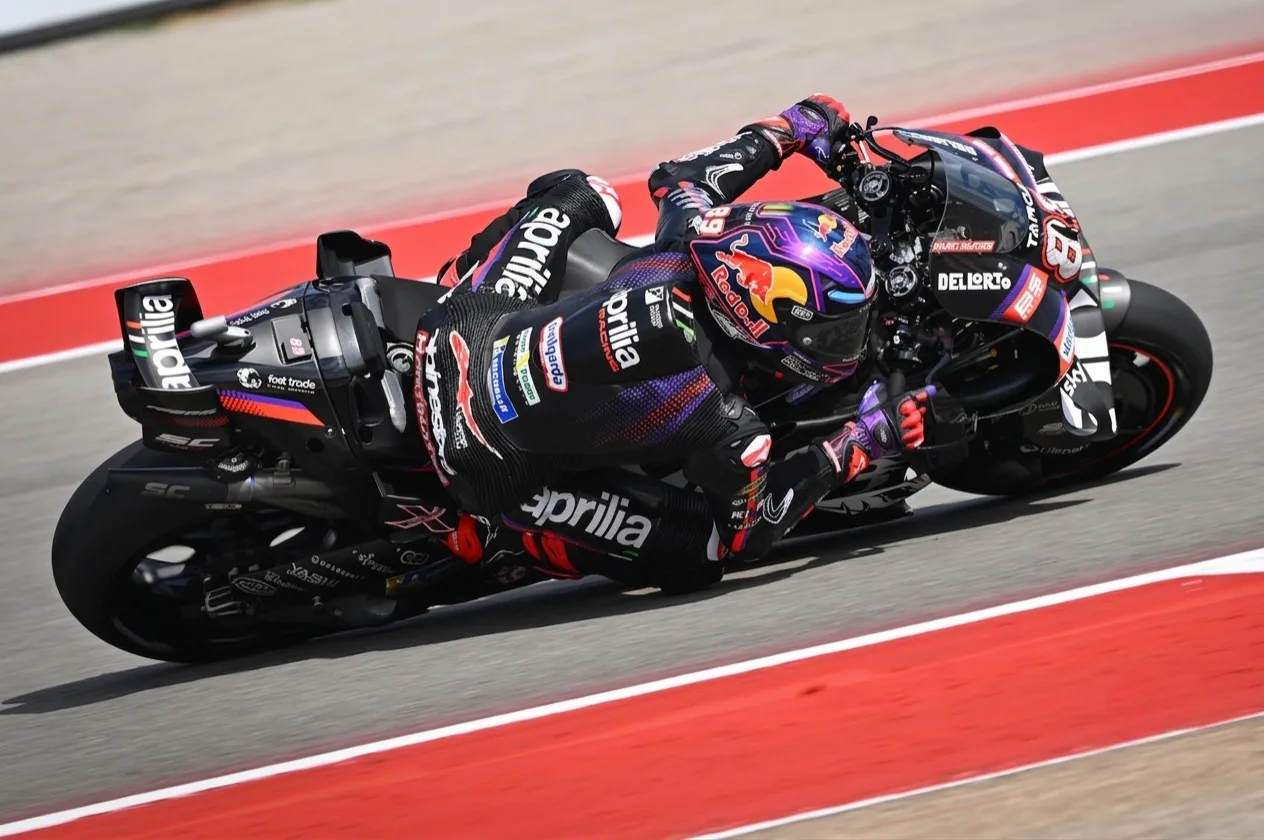 MotoGP race in action — riders battling through a corner during the 2026 World Championship season