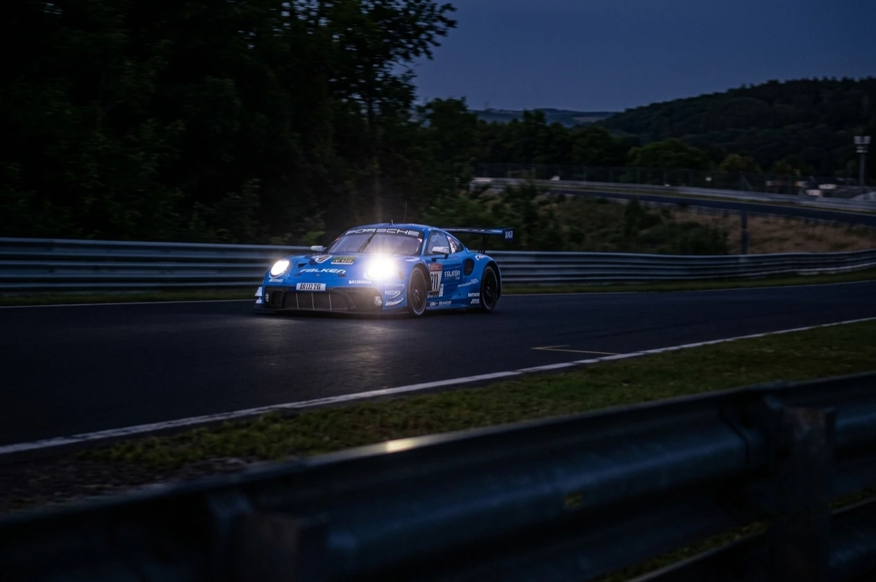 Mercedes-AMG GT3 endurance car racing through the forest sections of the Nürburgring Nordschleife