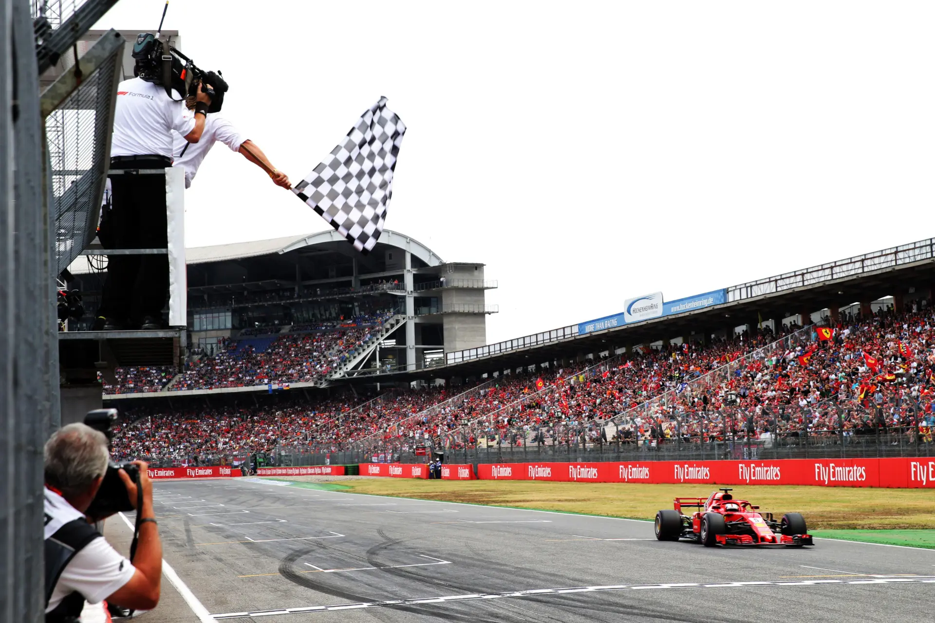 Formula 1 car attacking a corner during the final qualifying shootout