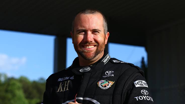 Top Fuel dragster launching off the line under the lights at NHRA Nationals Norwalk 2026