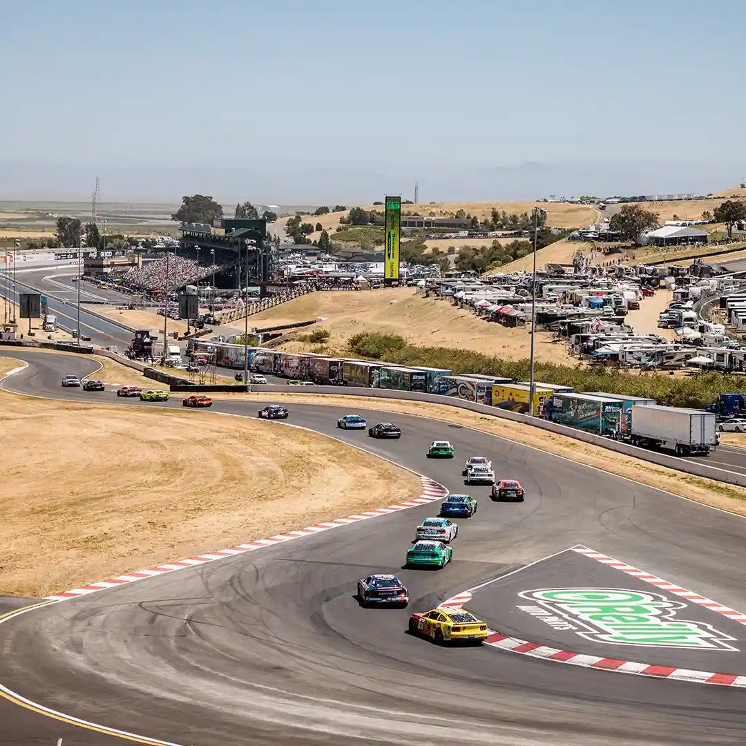 NASCAR race fans enjoying the atmosphere at a California road course event — Sonoma Raceway grandstand views