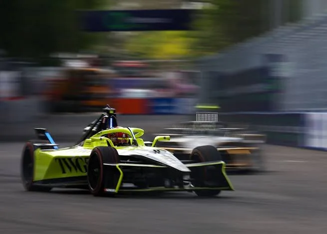 Electric racing cars lined up on a city street circuit — Formula E 2025-26 season teams and drivers