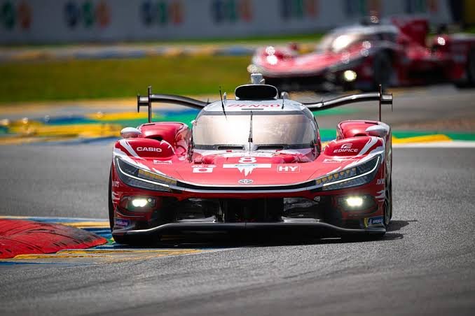 Toyota GR010 Hybrid at Le Mans 2026 running at night — second place after leading for 18 hours of the race