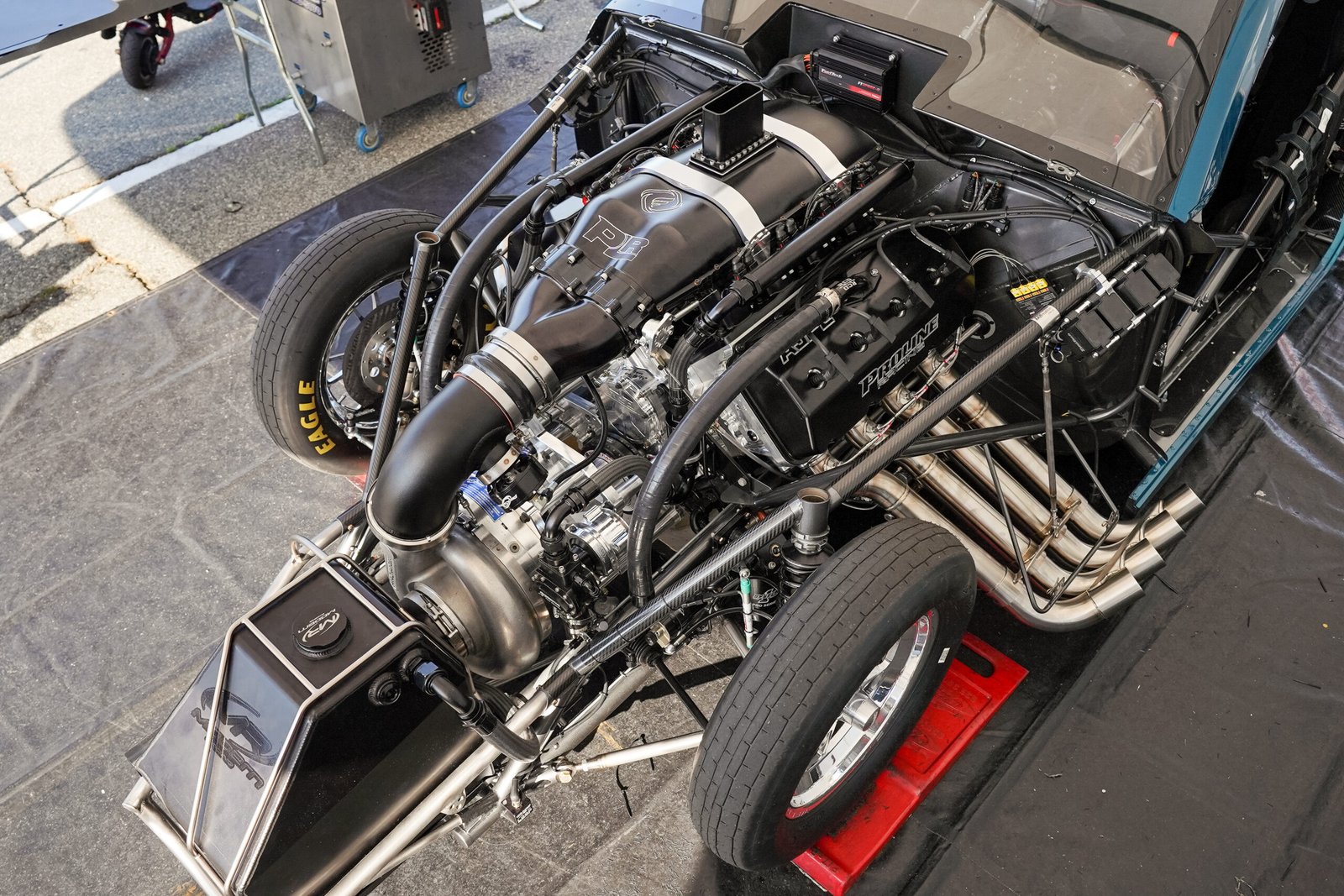 Race car engine at full power — NHRA 2026 season 75th anniversary Top Fuel horsepower and technology