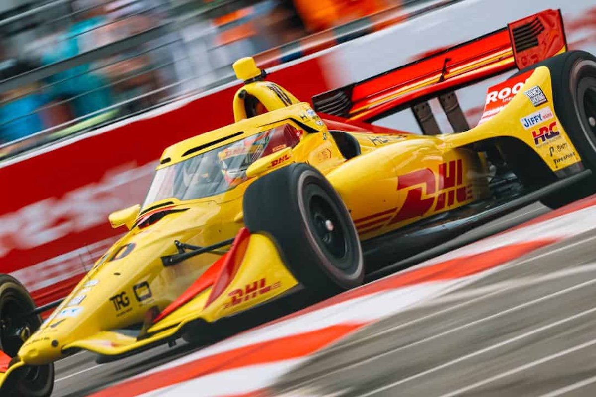 IndyCar race cars battling wheel to wheel — the Version 2 hybrid system aims to create more overtaking opportunities with longer, more powerful deployment windows