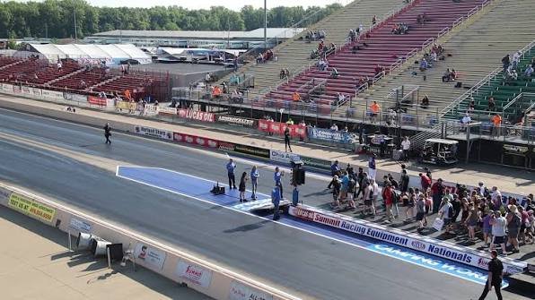 Drag racing pit crew preparing a Top Fuel dragster at Summit Motorsports Park NHRA Nationals Norwalk 2026