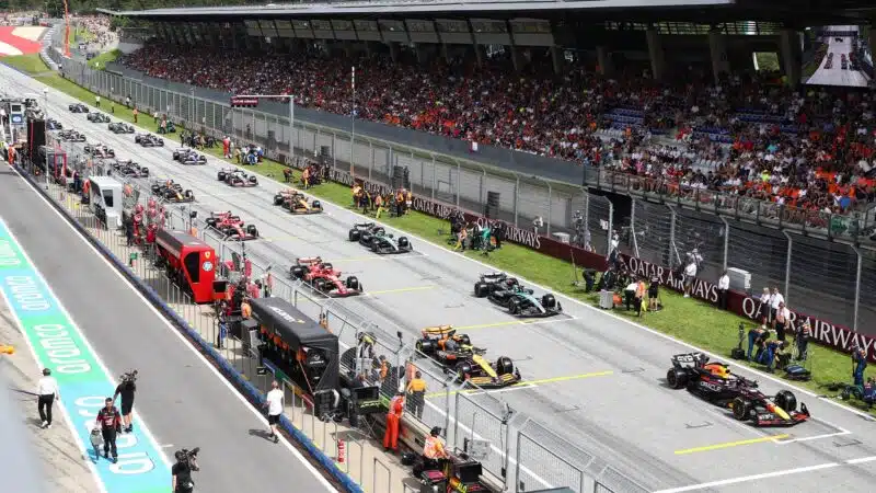 Formula 1 cars on the start grid before race start — 2026 F1 season calendar overview