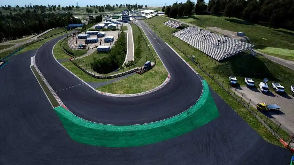 Formula 1 cars racing in close formation at the Hungaroring circuit during the Hungarian Grand Prix