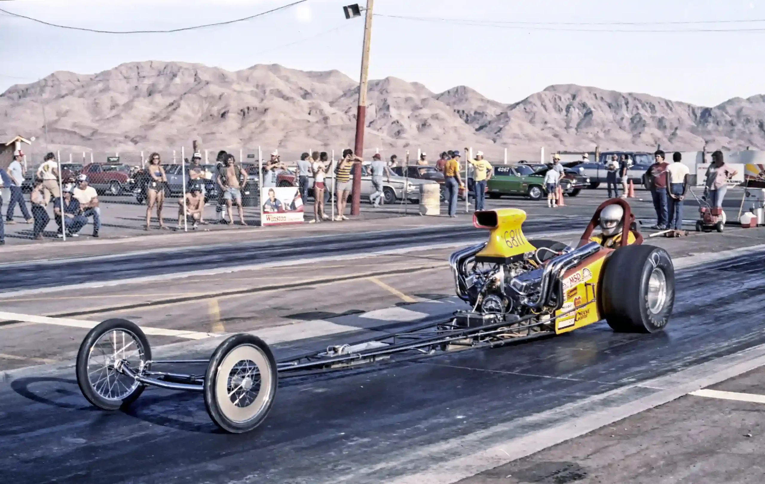Historic-style front-engine dragster representing the early nitromethane fuel-car layout