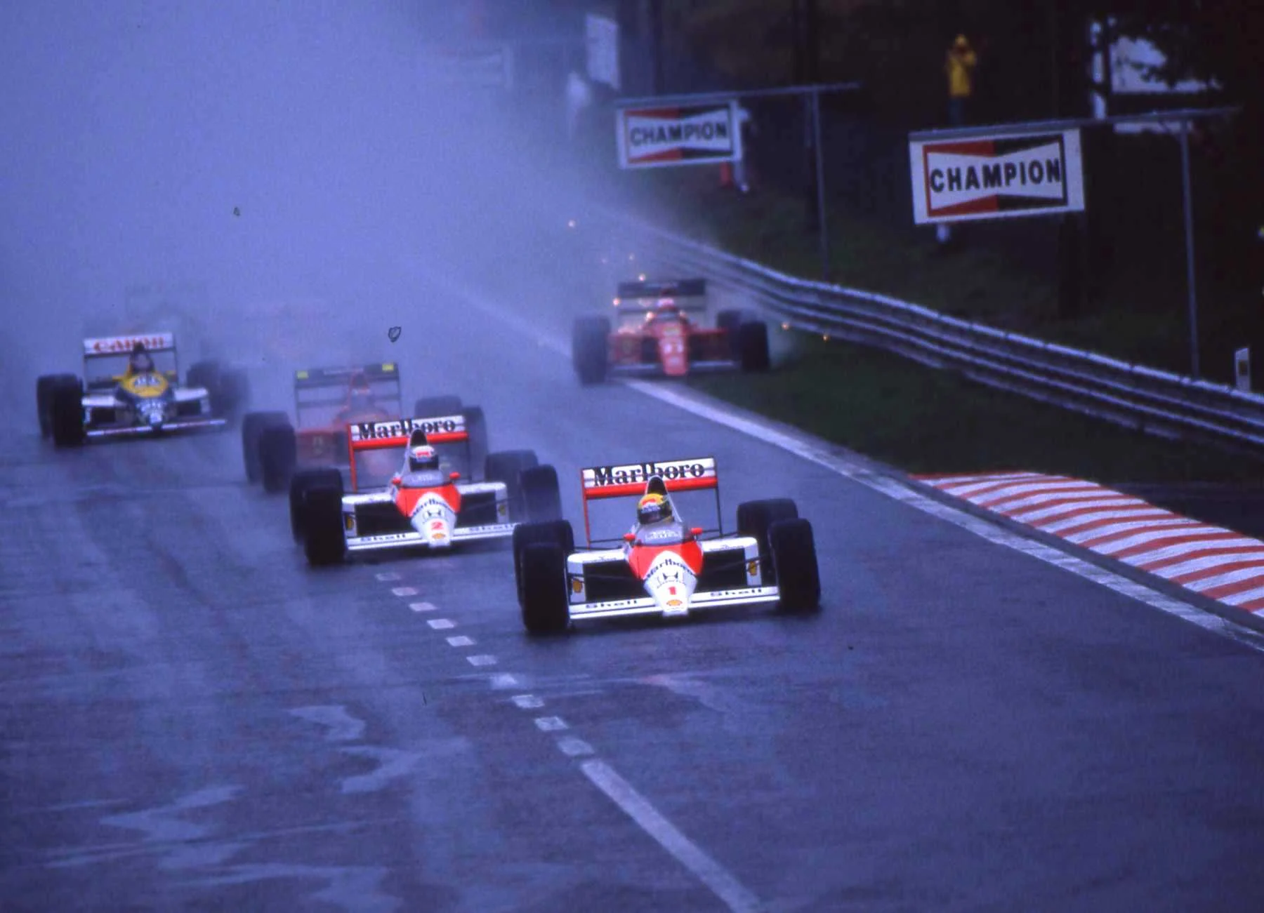 Ayrton Senna and Alain Prost leading the Formula 1 field at the start of the 1989 Belgian Grand Prix