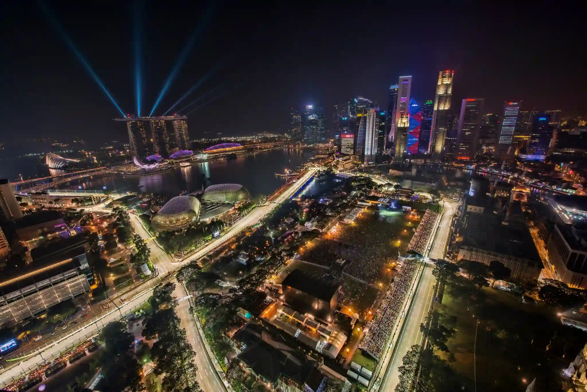 Singapore Formula 1 night race with the Marina Bay skyline and illuminated street circuit