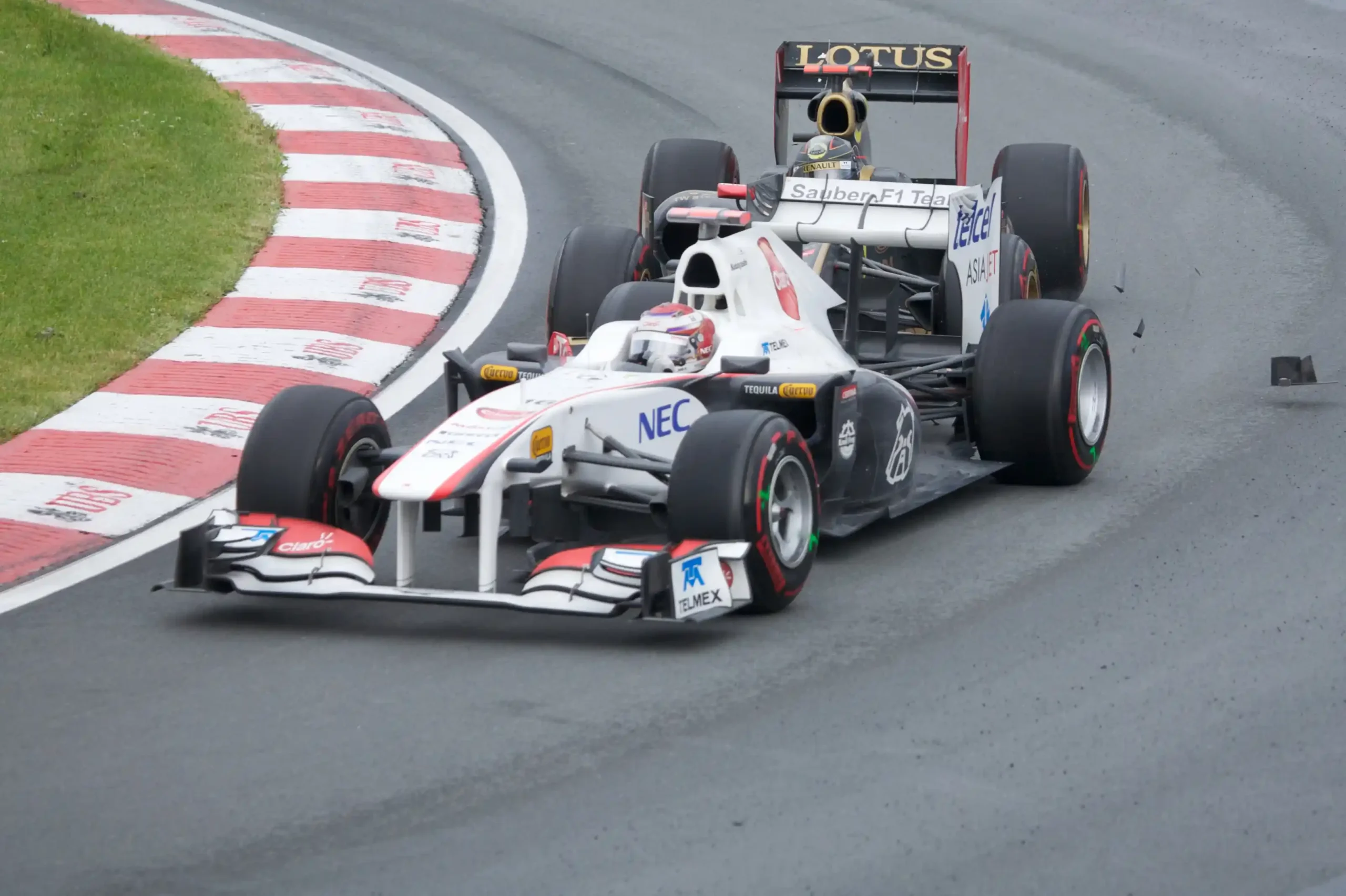 Nick Heidfeld's damaged Renault behind Kamui Kobayashi during the 2011 Canadian Grand Prix