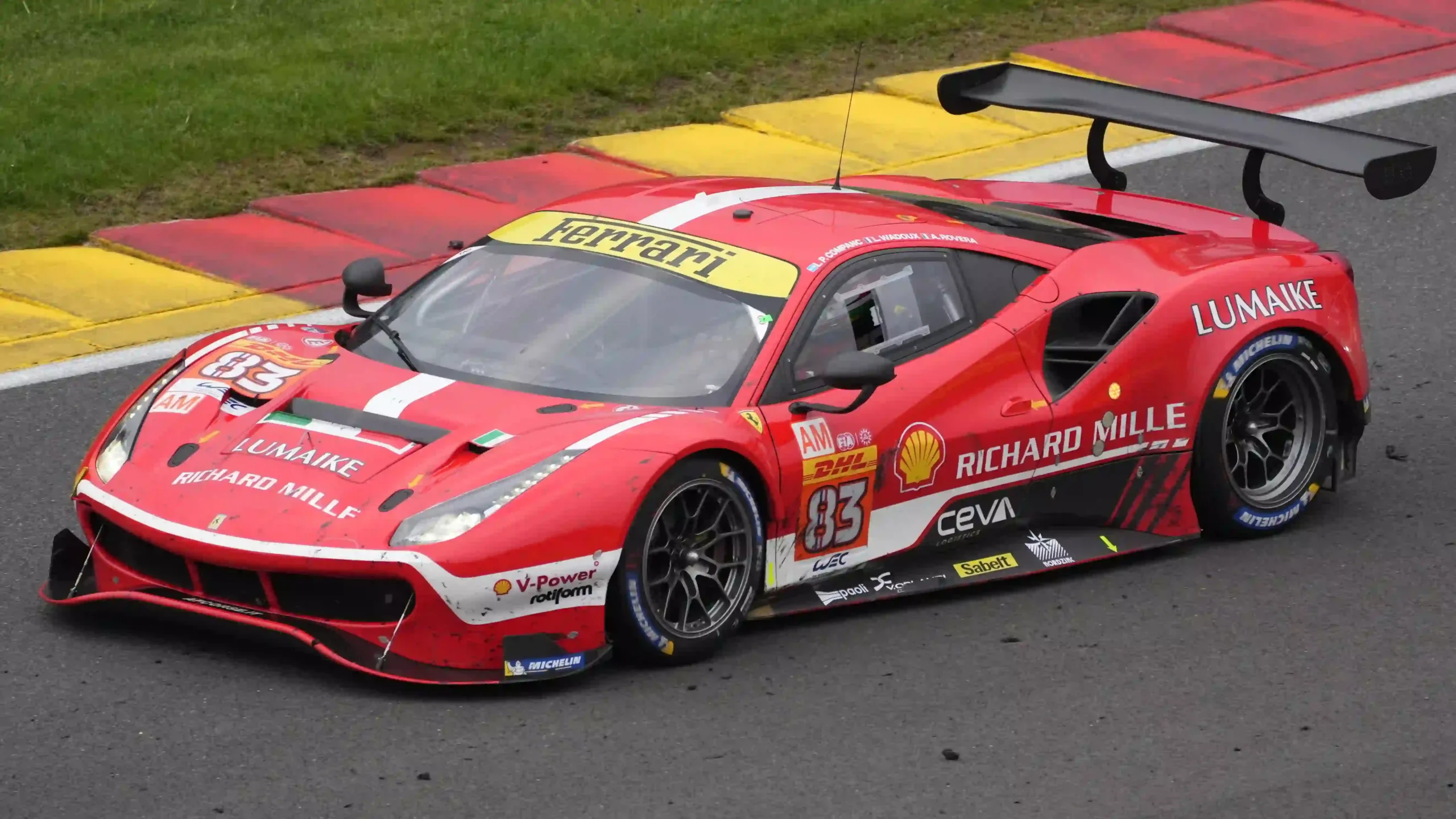 Ferrari 488 GTE climbing through Eau Rouge at Spa-Francorchamps