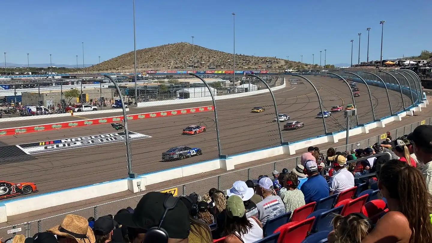 NASCAR Cup Series Next Gen cars racing side by side at Phoenix Raceway