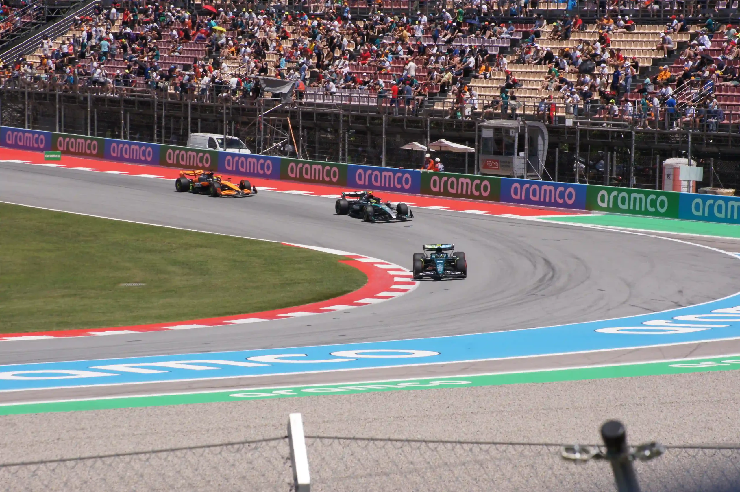 IndyCar field racing at the start of an event at Indianapolis in 2022