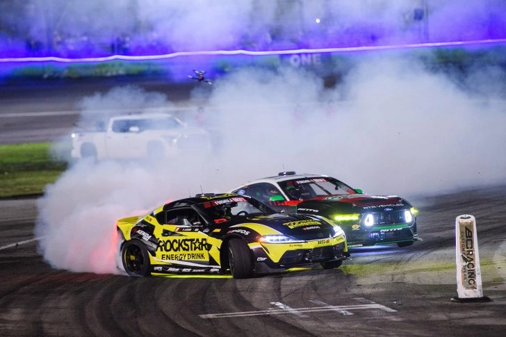 Fredric Aasbo and James Deane running side by side during the 2026 Formula DRIFT Orlando event