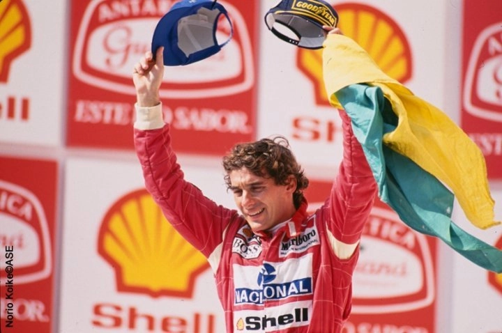Ayrton Senna celebrating victory at Interlagos in 1993