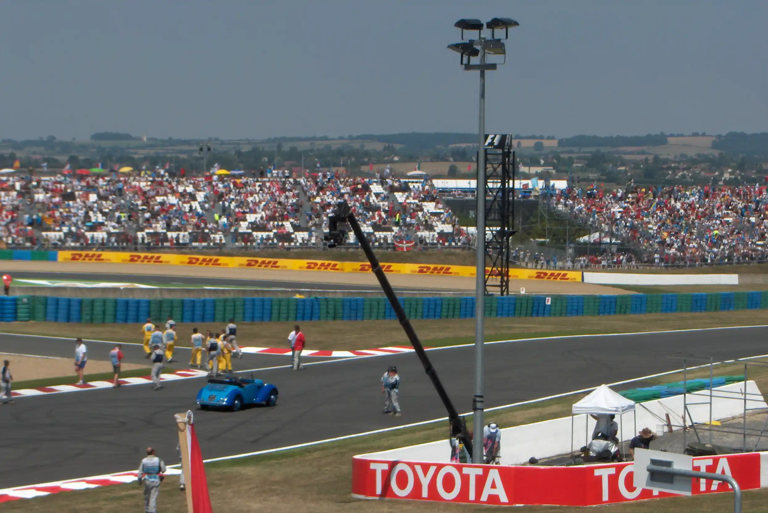 Television camera crane being prepared before the 2006 French Grand Prix at Magny-Cours
