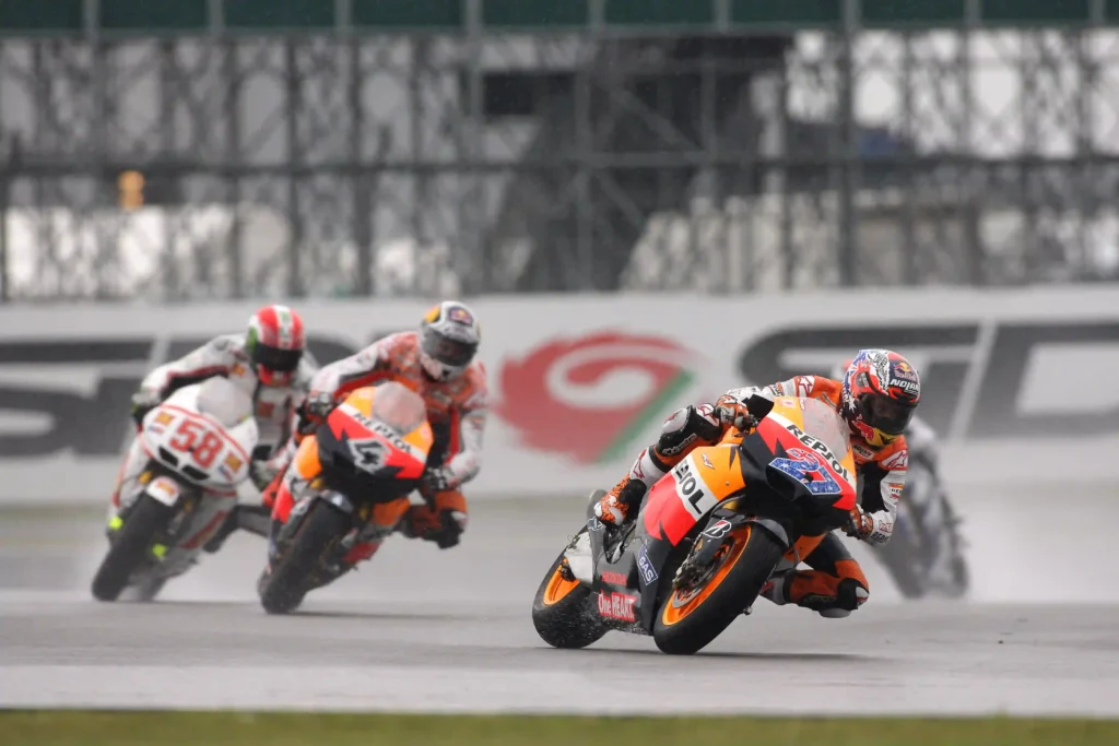 Casey_Stoner,_Andrea_Dovizioso,_Marco_Simoncelli_2011_Silverstone