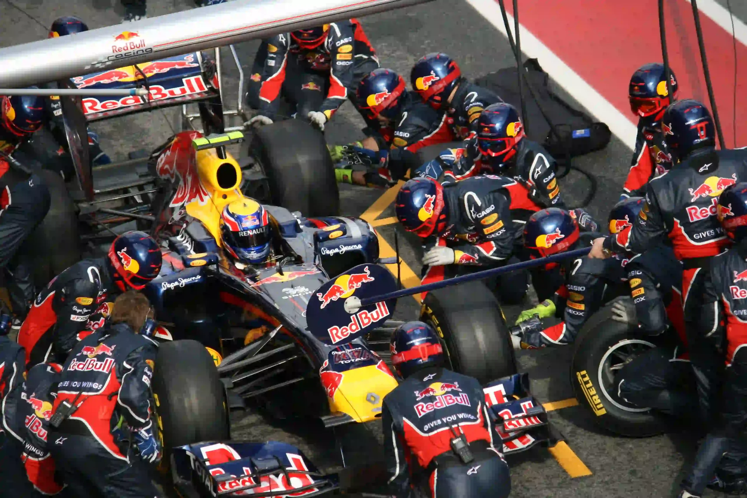Red Bull Formula 1 pit crew practicing a stop during 2011 Barcelona testing
