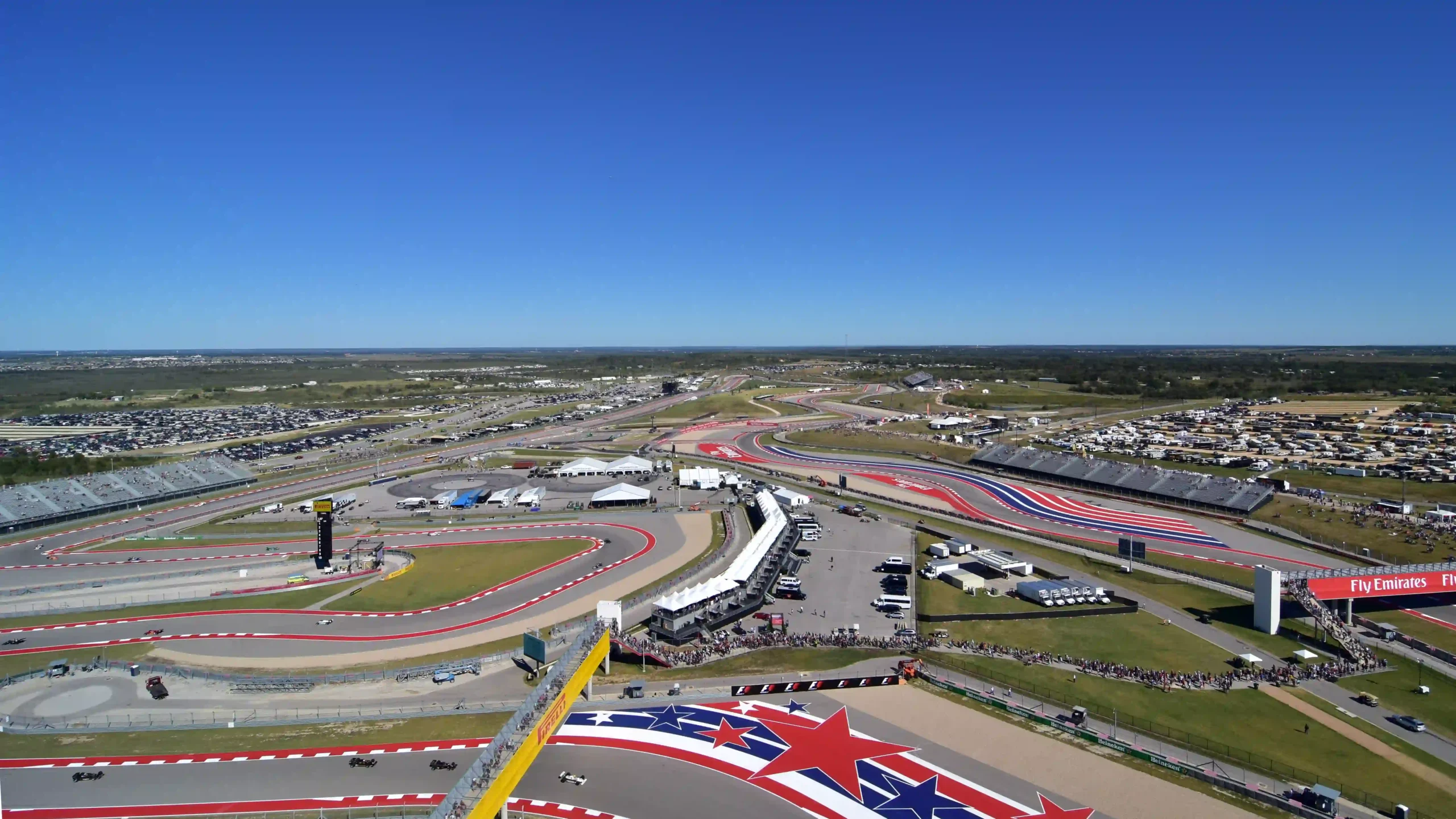 Wide view of Circuit of the Americas with multiple corners and runoff areas visible