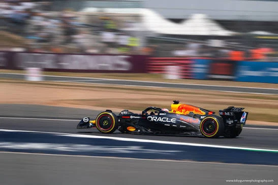 Formula 1 car at high speed through Silverstone's famous Copse corner during 2026 British Grand Prix Sprint Qualifying