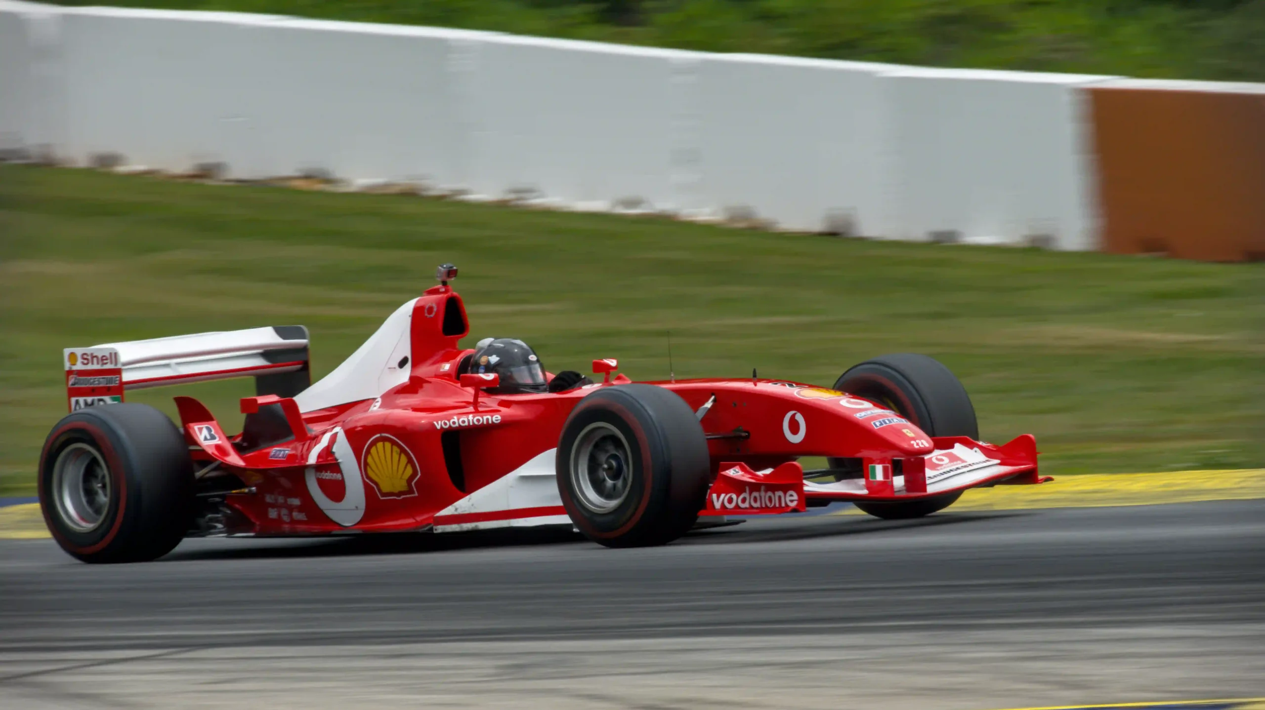 Ferrari Formula 1 car running on a racing circuit