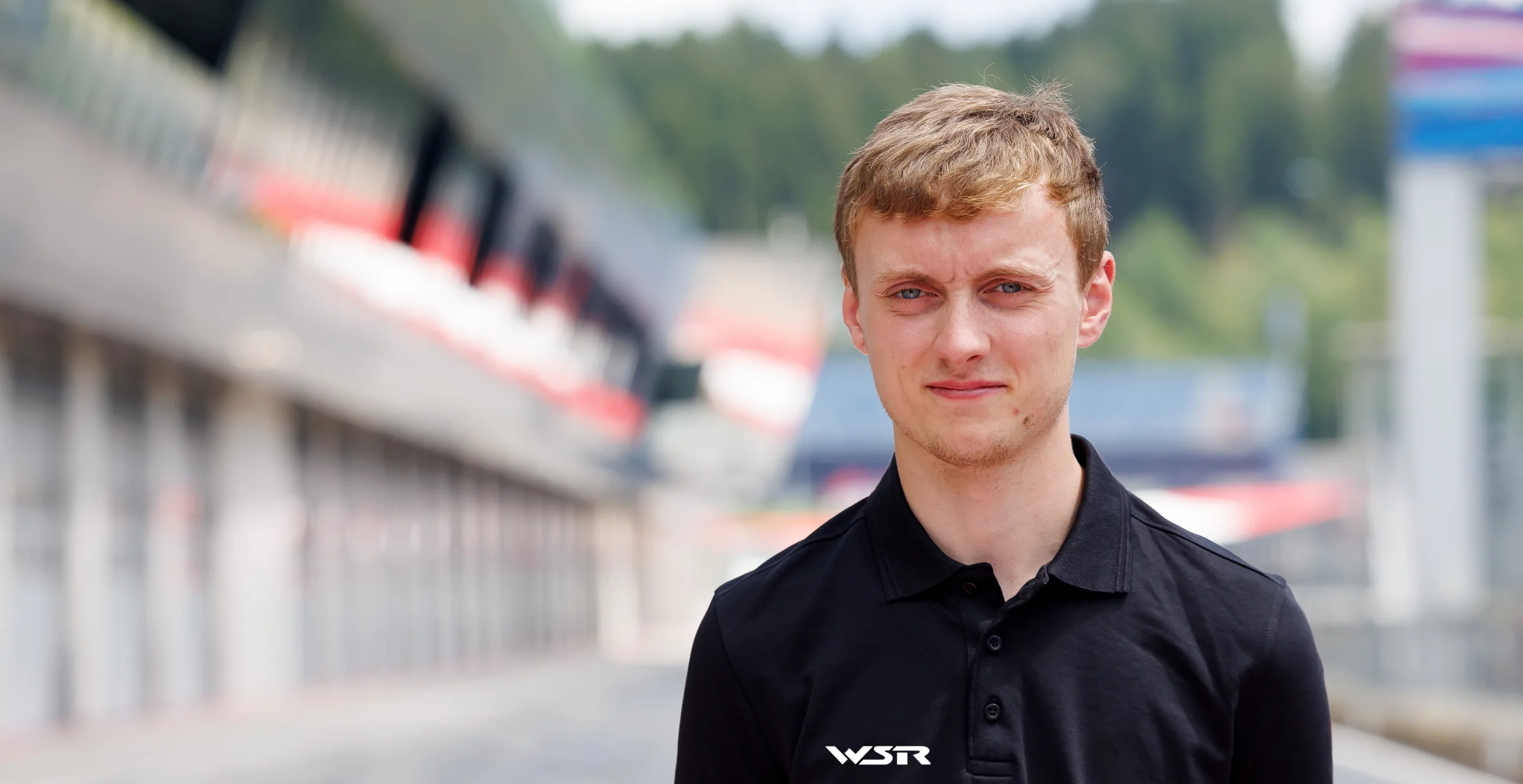 Lewis Gilbert wearing WSR team clothing before his 2026 BTCC debut at Thruxton