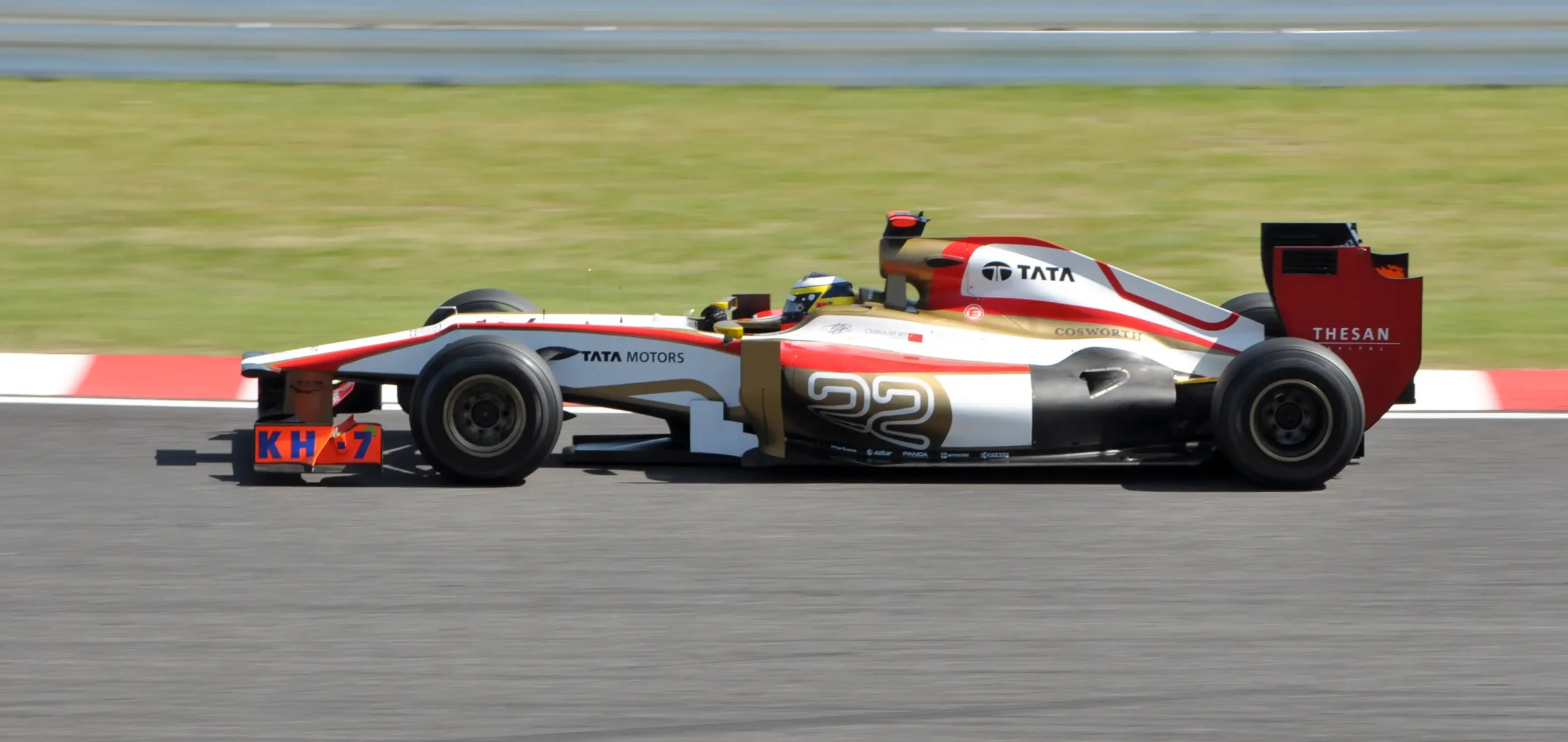 Pedro de la Rosa driving an HRT through the high-speed Esses at Suzuka