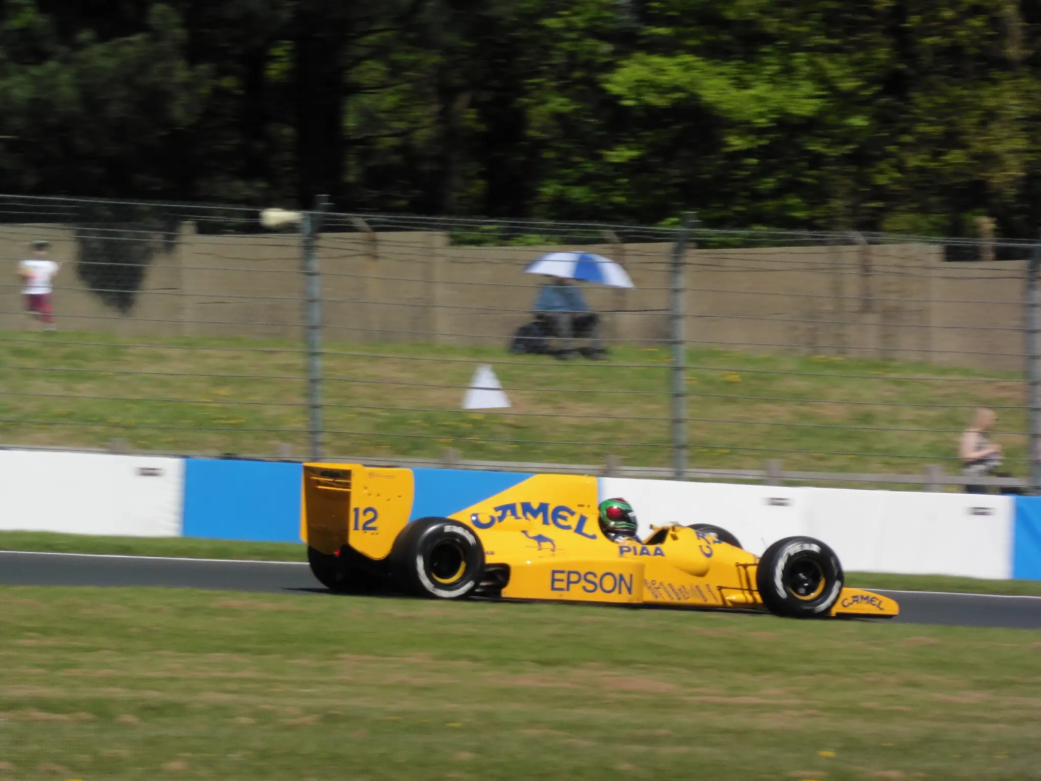 Historic Lotus 101 Formula 1 car demonstrating the open-wheel single-seater layout