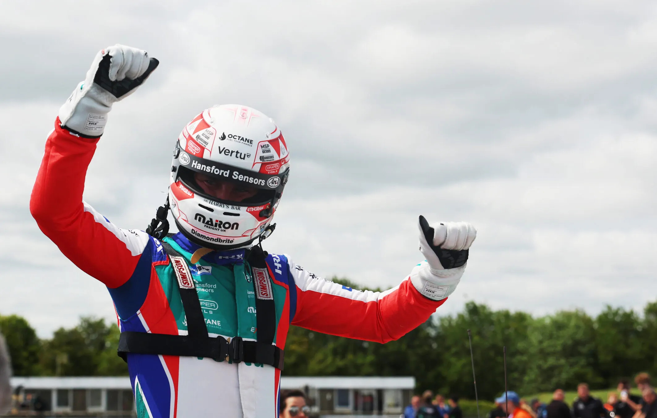 Tom Ingram celebrating his 2025 BTCC race victory at Thruxton