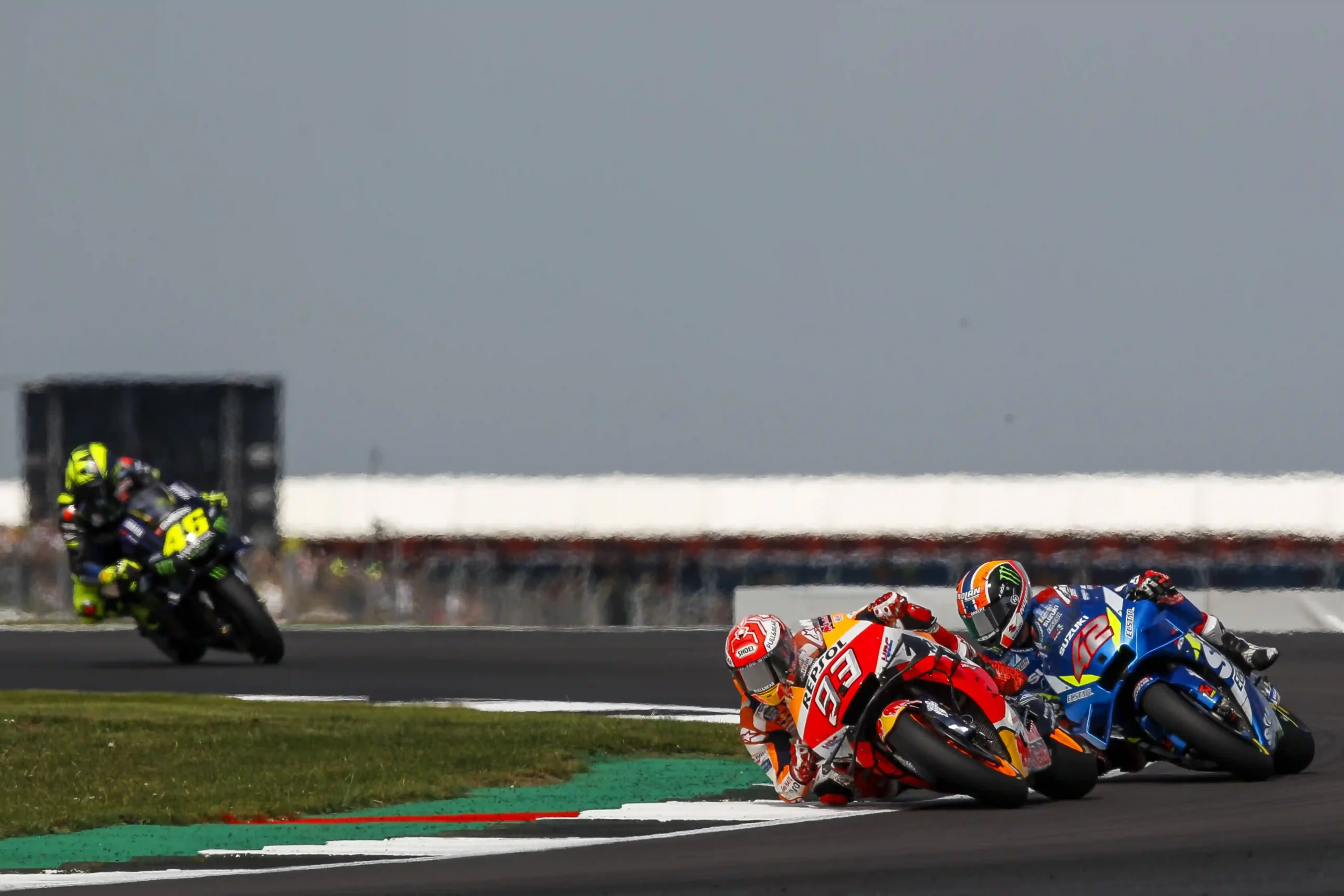 Marc Marquez leading Alex Rins and Valentino Rossi during the 2019 British MotoGP at Silverstone