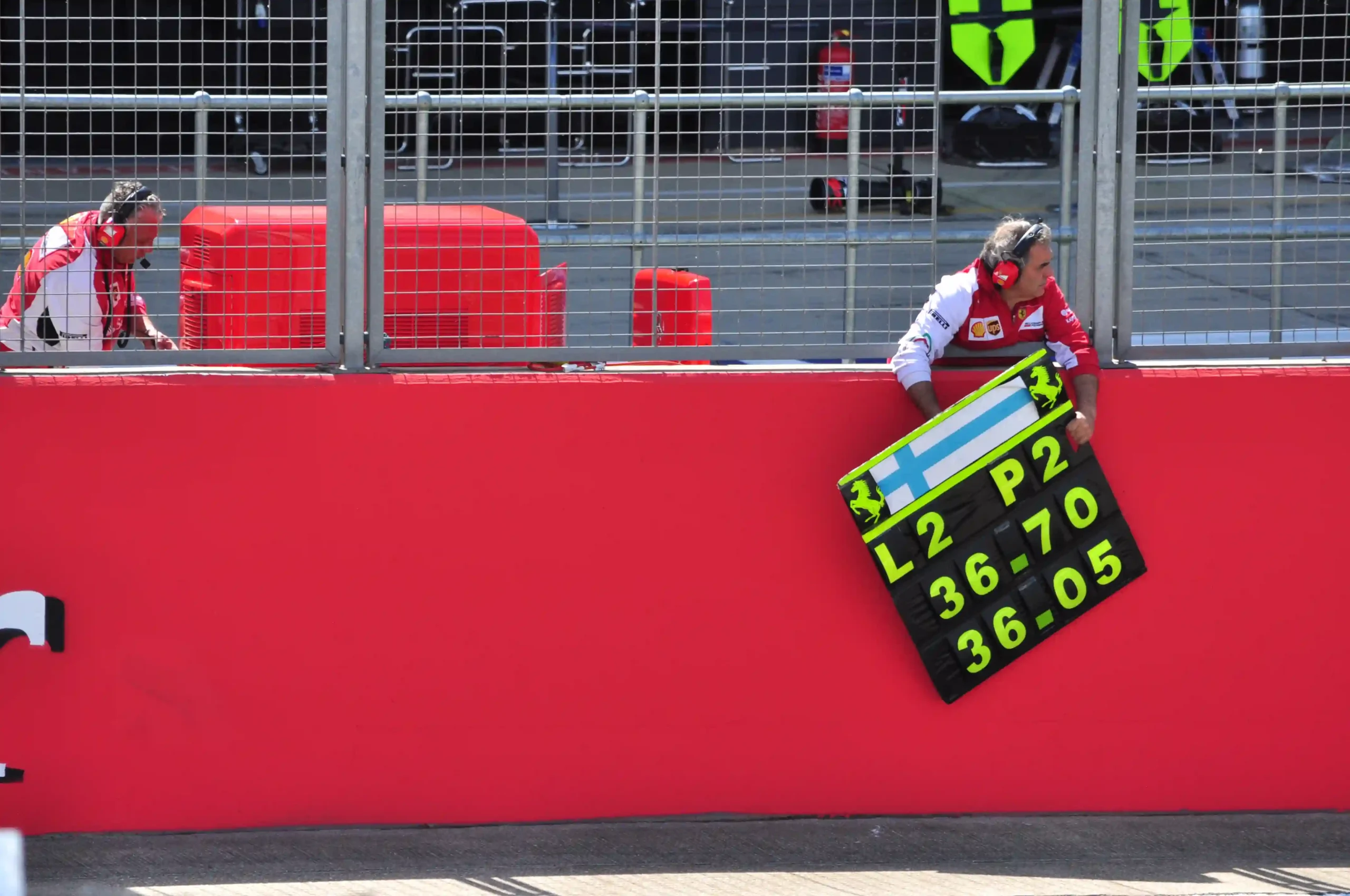 Formula 1 pit board held over the pit wall during the 2014 British Grand Prix