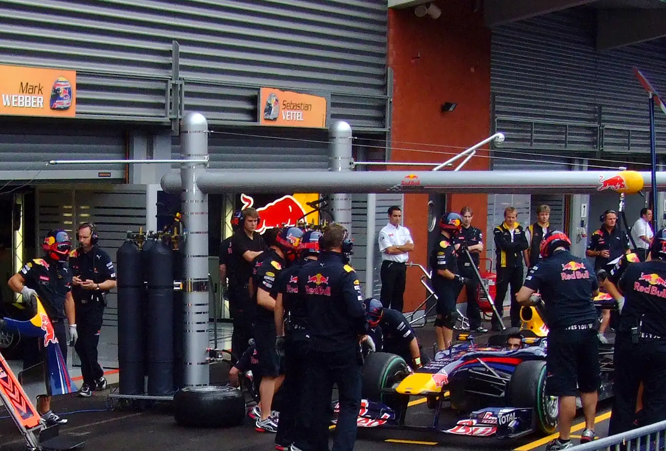 Red Bull Racing Formula 1 team practicing pit stops before the 2010 Belgian Grand Prix