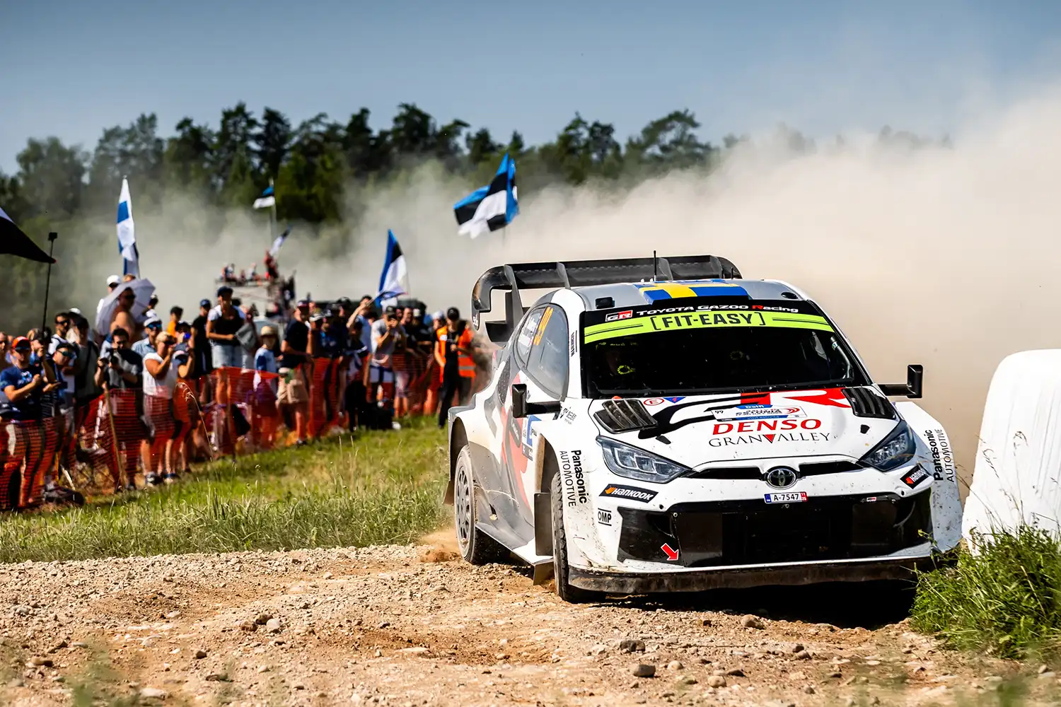Toyota GR Yaris Rally1 racing on a fast gravel stage at WRC Rally Estonia