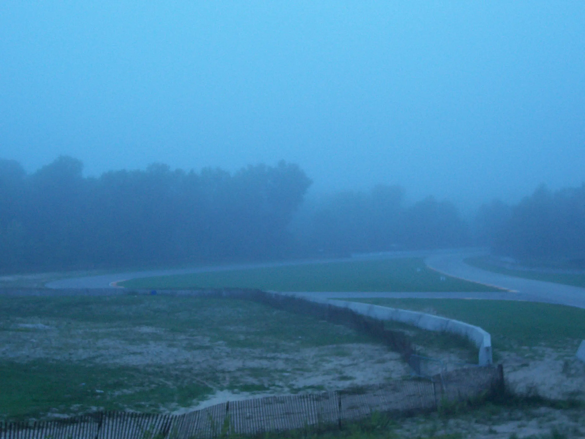 The Kink section of Road America viewed during damp and foggy conditions