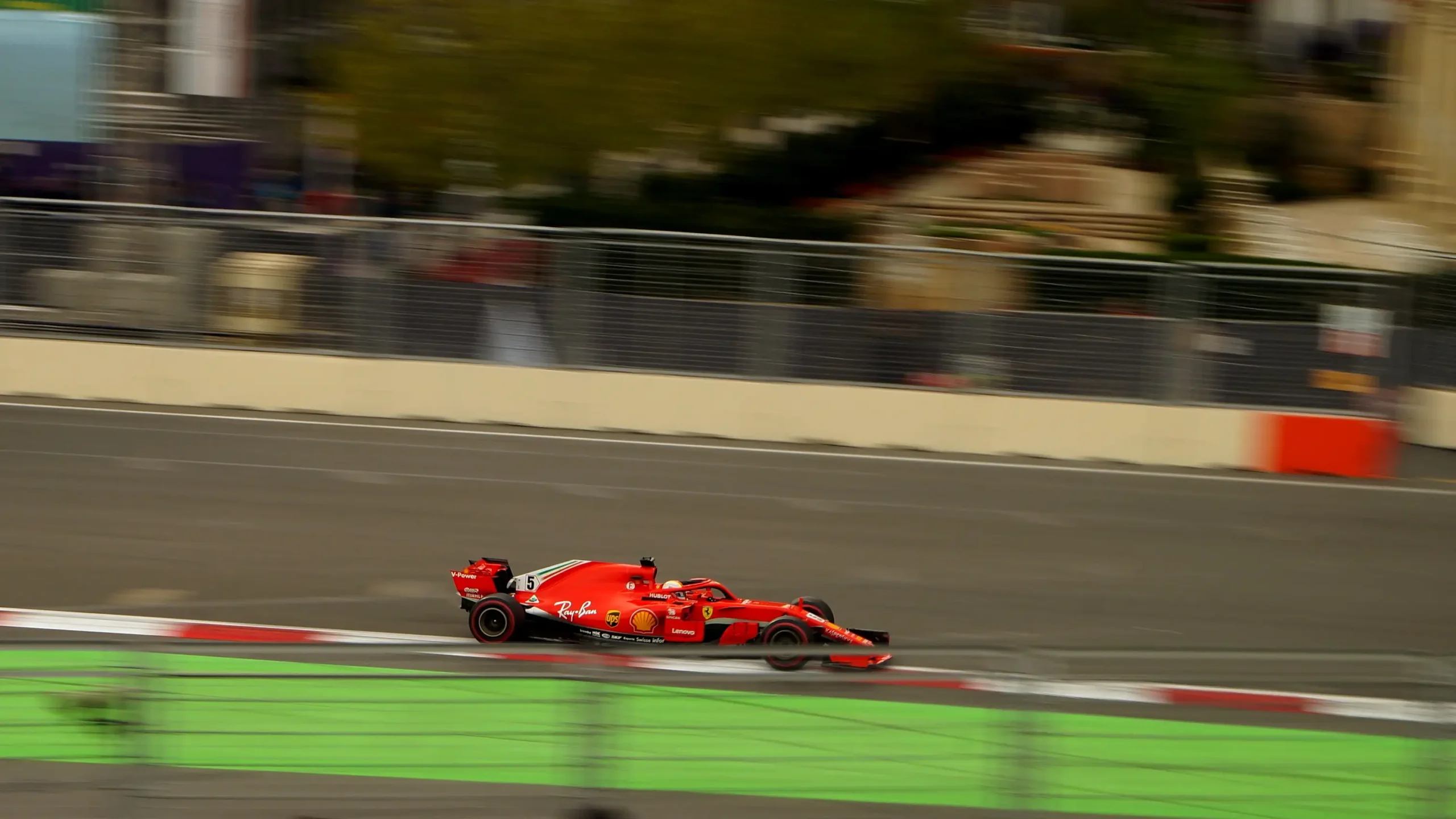 Sebastian Vettel driving a Ferrari on the Baku City Circuit in 2018