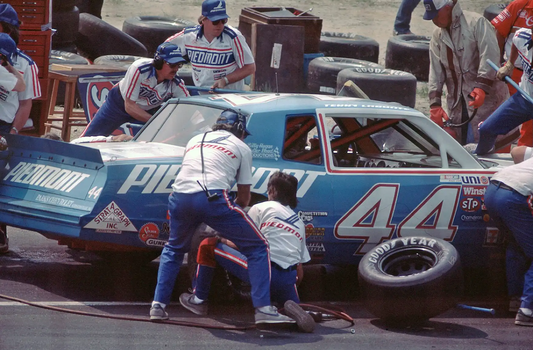 Terry Labonte receiving a traditional five-lug NASCAR pit stop during his 1984 championship season