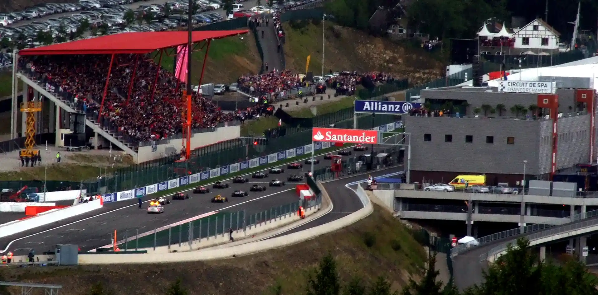 Formula 1 cars lined up across the full starting grid before a race