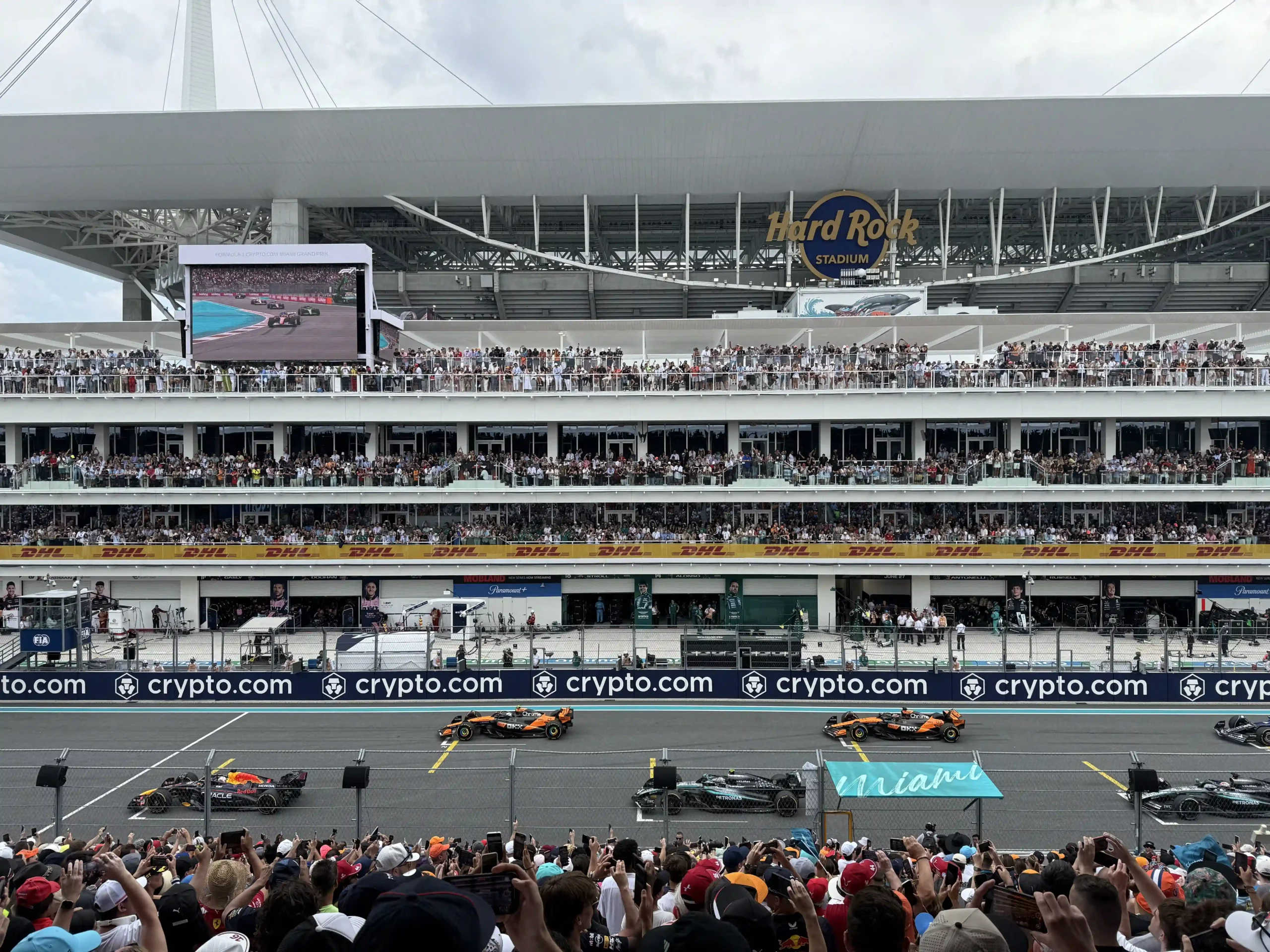 The first three rows of Formula 1 cars lined up on the grid before the 2025 Miami Grand Prix