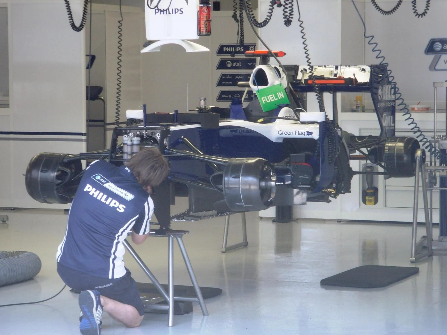 Mechanic working on a Williams FW31 Formula 1 car during practice for the 2009 Turkish Grand Prix