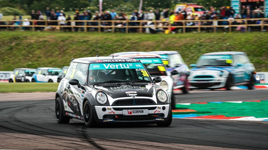 MINI CHALLENGE Trophy cars racing through the Thruxton chicane