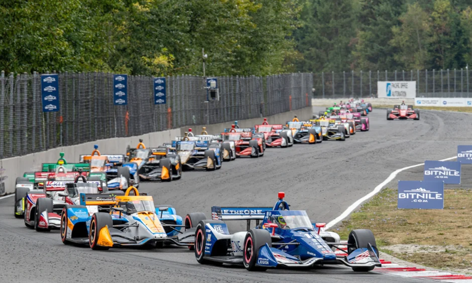 IndyCar field running closely together at Portland International Raceway