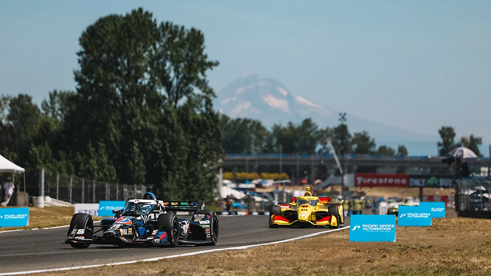 NTT INDYCAR SERIES field racing in the opening laps of the 2026 Grand Prix of Portland