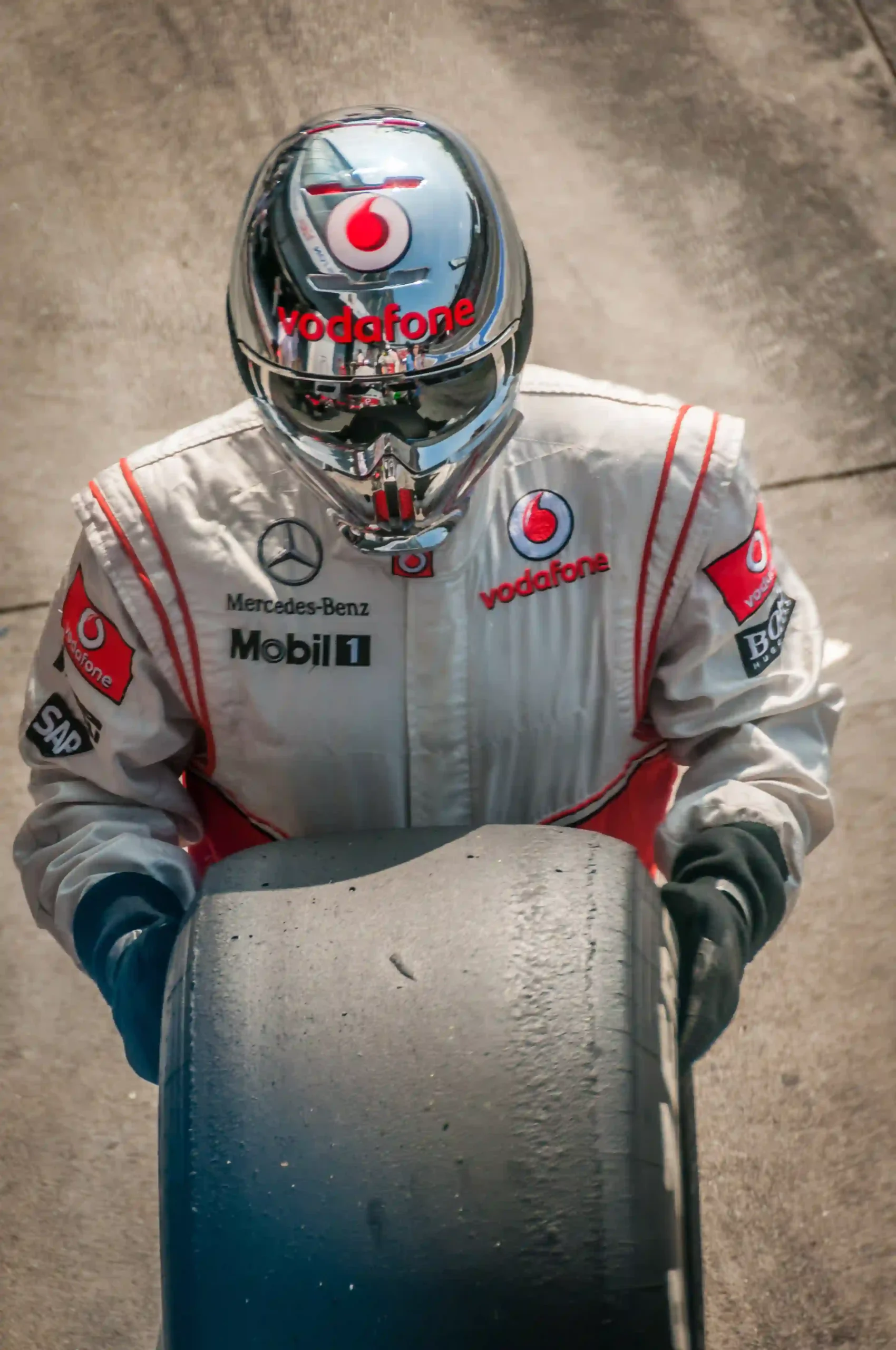McLaren Formula 1 mechanic in pit crew equipment at the 2012 Italian Grand Prix